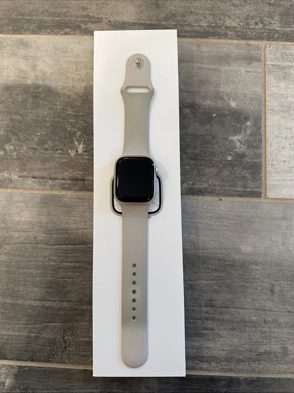 Apple Watch in Light Gray Silicone with Black Display
